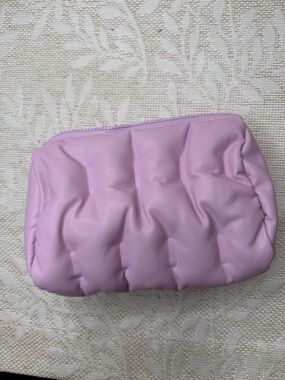 drunk elephant travel makeup bag Butter Yellow Pink Coast Boutique making the kit suitable for all skin types DRUNK ELEPHANT LIMITED EDITION COSMETIC